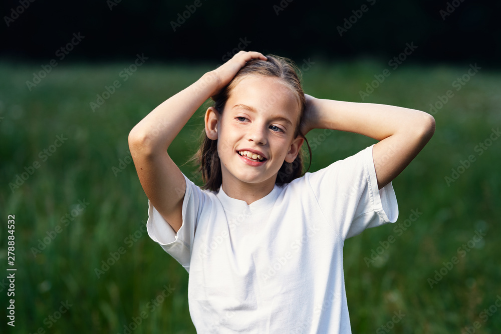 portrait of young man in a field portrait of young man in a field