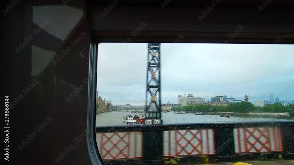London Eye From Lambeth Bridge On A Rainy Day. Slow Motion London Eye From Lambeth Bridge On A Rainy Day. Slow Motion