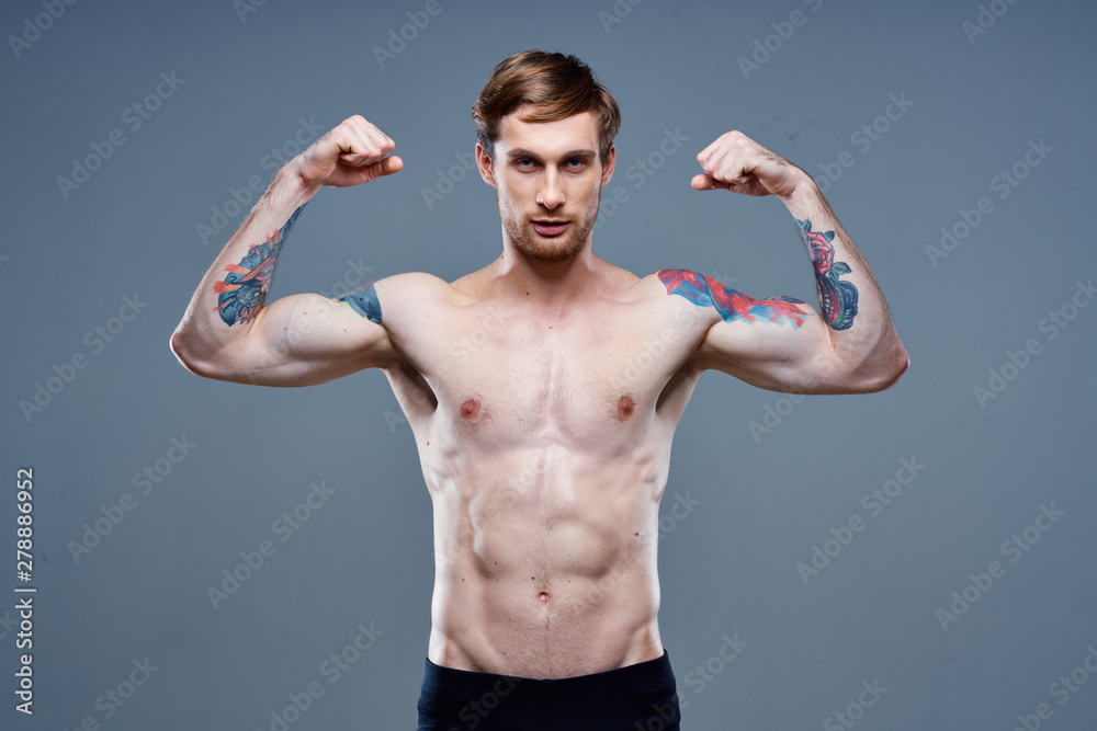 young man with arms outstretched young man with arms outstretched