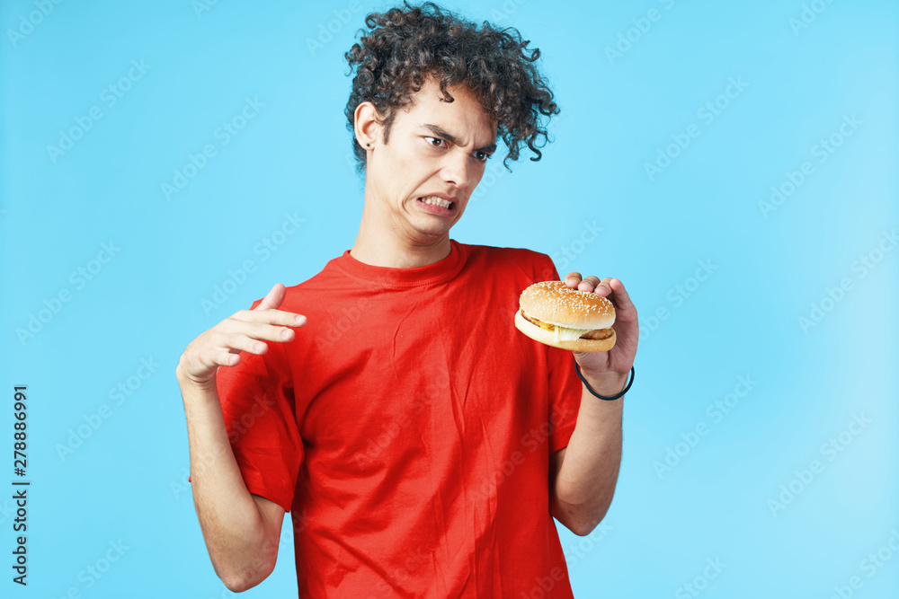 young man eating cake young man eating cake