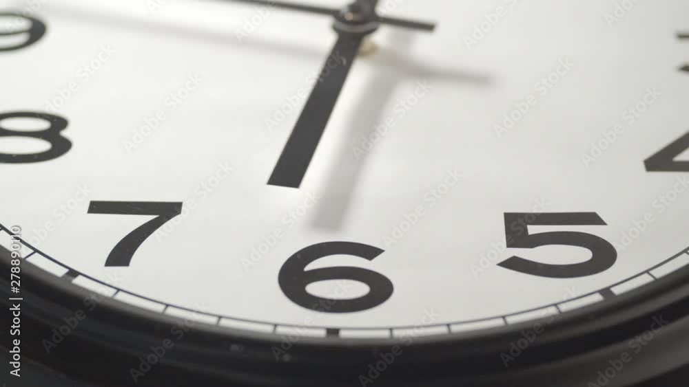 Clock Face Close Up in Time Lapse on Wall in Office Clock Face Close Up in Time Lapse on Wall in Office
