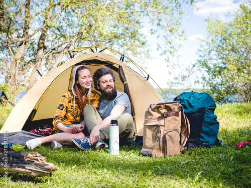 Couple have a rest in tent 