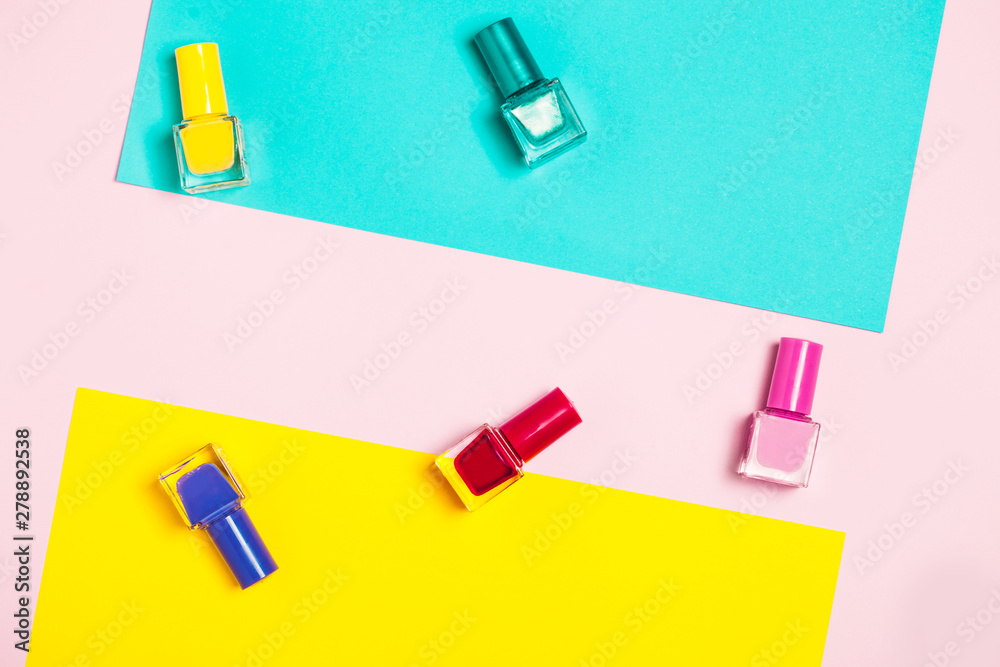 Nail polish bottles pattern background. Close up. Nail polish bottles pattern background. Close up.