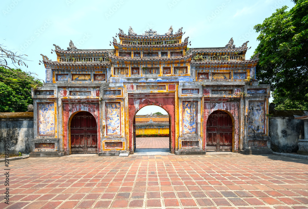 Obraz premium Colorful imperial city gate. This is lead into the forbidden city where the feudal king work Imperial Royal was in the 19th century in Hue, Vietnam