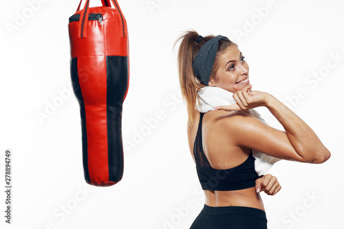 woman in boxing gloves on white background