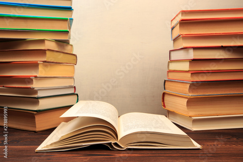 Education learning concept with opening book or textbook in old library, - Image