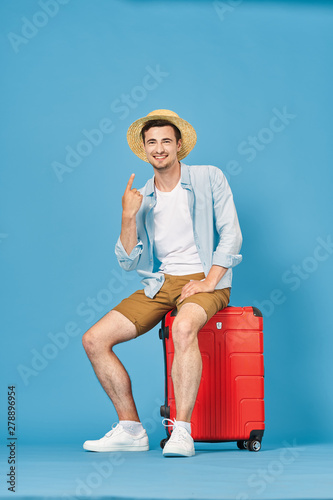 young woman with suitcase