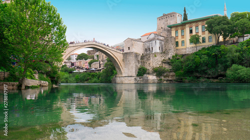 Old town of Mostar and Stari Most bridge above beautiful emerald river Neretva. - April 2019, Mostar, Bosnia and Herzegovina. © Natasa