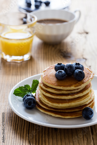 Morning meal  homemade pancakes  fresh summer berries