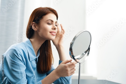woman with magnifying glass