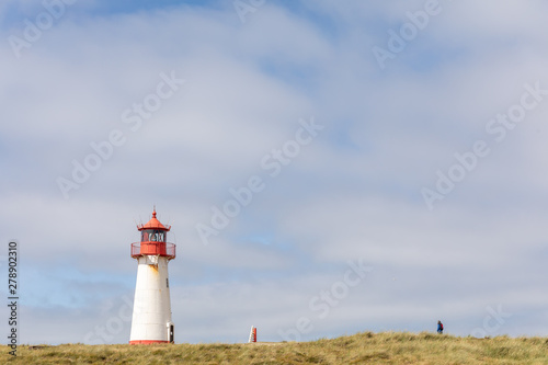 red-white lighthouse on the island of Sylt