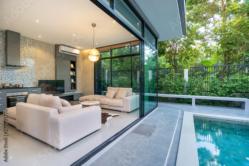 exterior home with swimming pool in the house