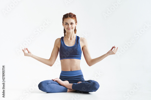 young woman doing yoga