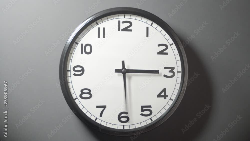 Clock Face Close Up in Time Lapse on Wall in Office Clock Face Close Up in Time Lapse on Wall in Office