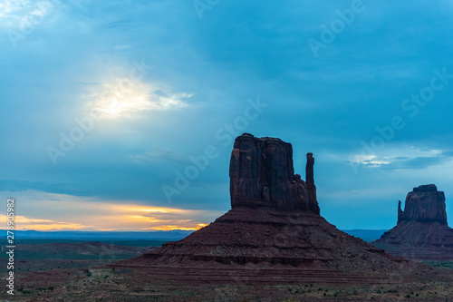 Sunrise over the famous mitten and merrick buttes of Monument Valley