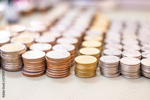 Business concept of making or saving money on investment, Stack coins,  Stock, Business improvement, Exchange, Money growth. Thai letter meaning is King of Thailand