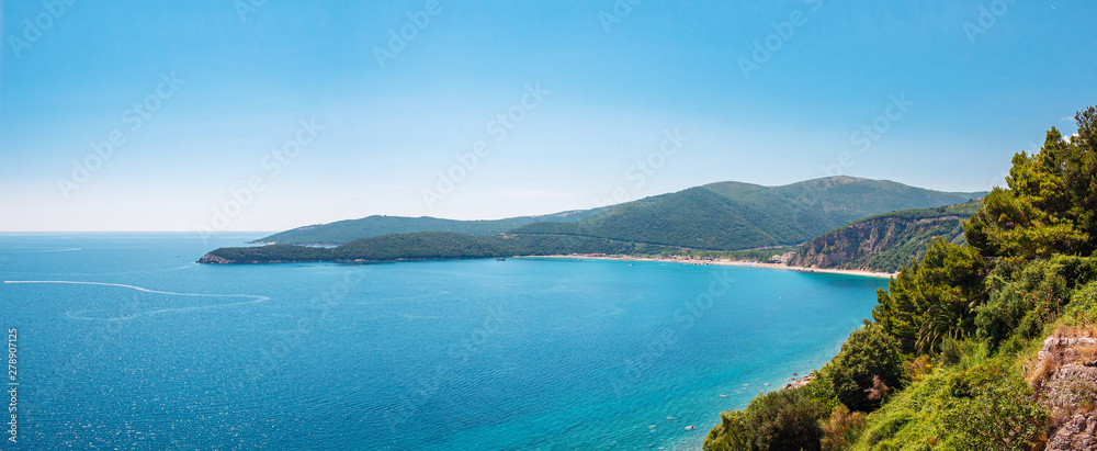 Panoramic view from above to the Adriatic sea coastline and Jaz beach near a Budva city, Montenegro