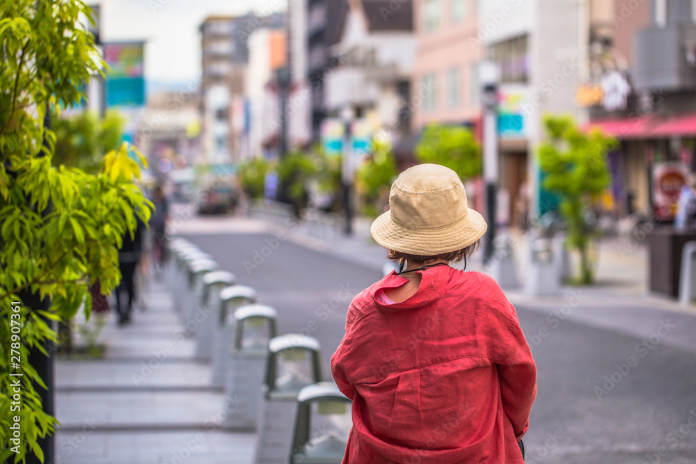 Nara - May 31, 2019: Tourists in the streets of Nara, Japan