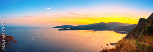 Panoramic view from above to the Adriatic sea coastline with Jaz beach at sunset time, Montenegro © O.Farion