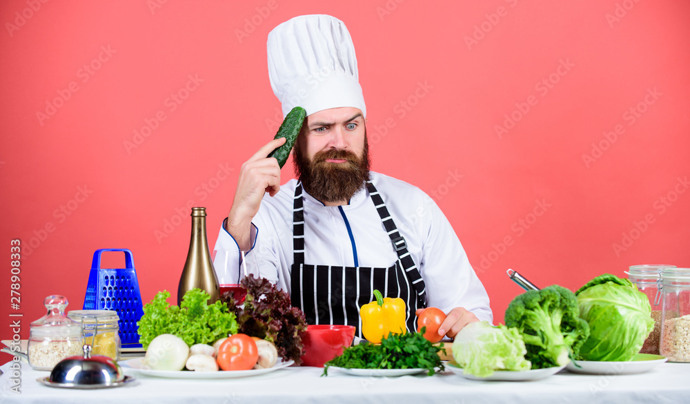 Delicious supper. Bearded man cook in kitchen, culinary. Healthy food cooking. Dieting and organic food, vitamin. Vegetarian. Mature chef with beard. Chef man in hat. Secret taste recipe Delicious supper. Bearded man cook in kitchen, culinary. Healthy food cooking. Dieting and organic food, vitamin. Vegetarian. Mature chef with beard. Chef man in hat. Secret taste recipe