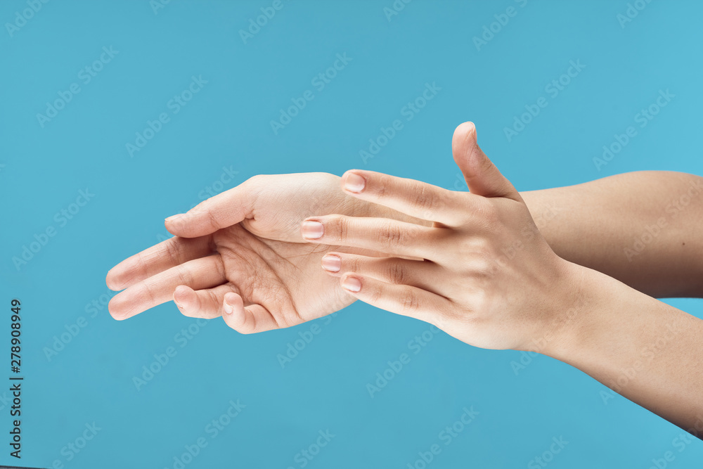 hand of man and woman holding hands