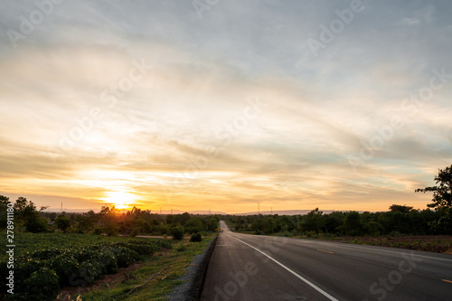 The road in the valley at the time of the sunset Concept of vacation and travel © BNMK0819