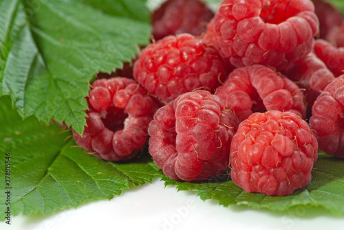 isolated image of ripe raspberries close up