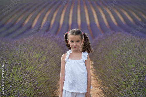 Fototapeta Naklejka Na Ścianę i Meble -  Valensole, France. Girl in lavender field