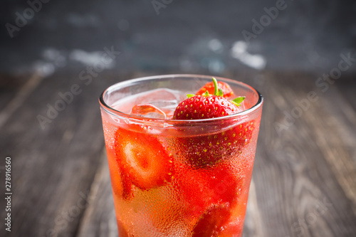 Strawberry cocktail on the rustic background. Selective focus. Shallow depth of field.