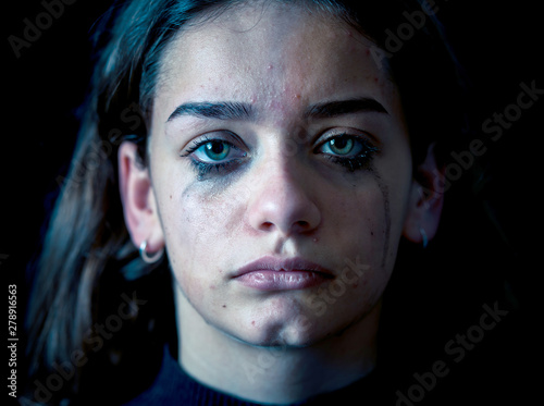 Canvas-taulu Portrait of sad, unhappy young girl crying. Helpless, depressed
