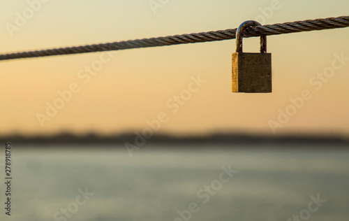 Multi-colored padlocks intertwined