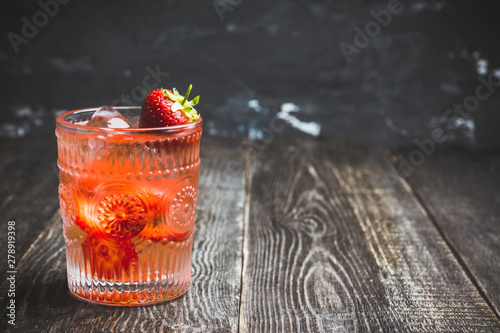 Old fashioned strawberry cocktail. Selective focus. Shallow depth of field.