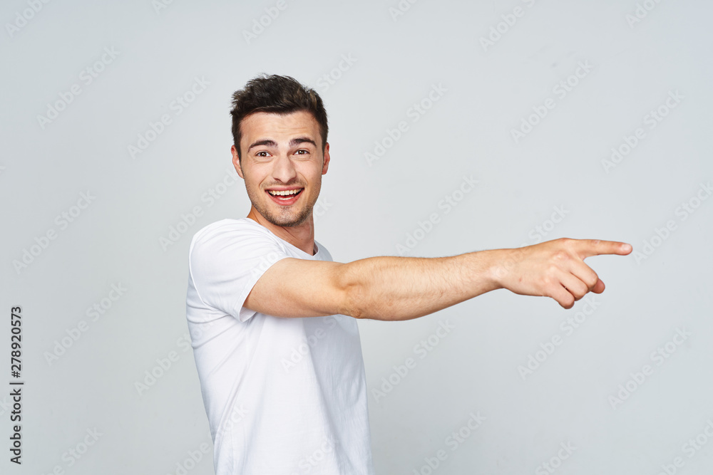 young man pointing at something