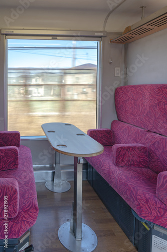 Interior of East Japan Railway Gono line Resort Shirakami sightseeing train in Akita station. the train rides from Akita to Aomori, operated by the East JR company photo