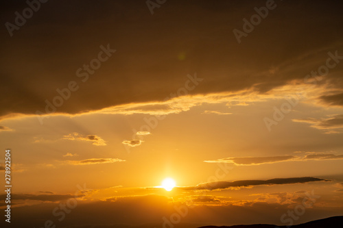 Red sunset with cloudy sky