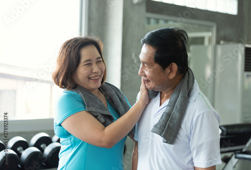 Asian senior adult couple care together after exercise fitness strength.