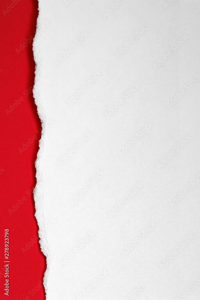 white inscription paper with a torn edge on a red background white inscription paper with a torn edge on a red background
