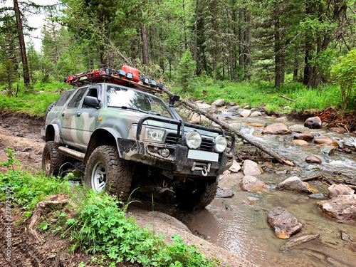 Off-road vehicle goes on the mountain way, Altai © natus111
