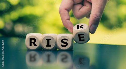 Hand turns a cube and changes the word 