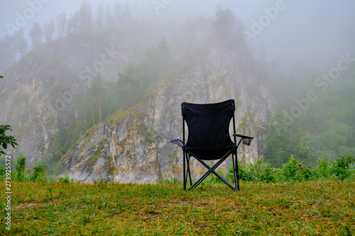 Chair outdoor on the mountain to observe the morning fog