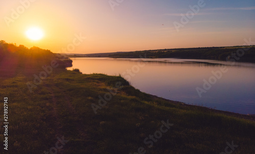 Sunset on the edge of a lake in the country  Moldova  2019