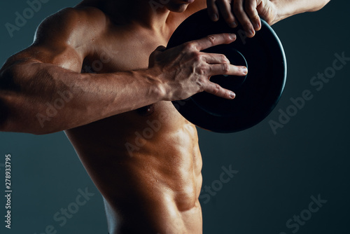 bodybuilder flexing his muscles