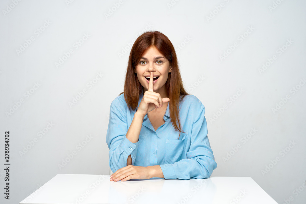 portrait of a young woman sitting on sofa portrait of a young woman sitting on sofa