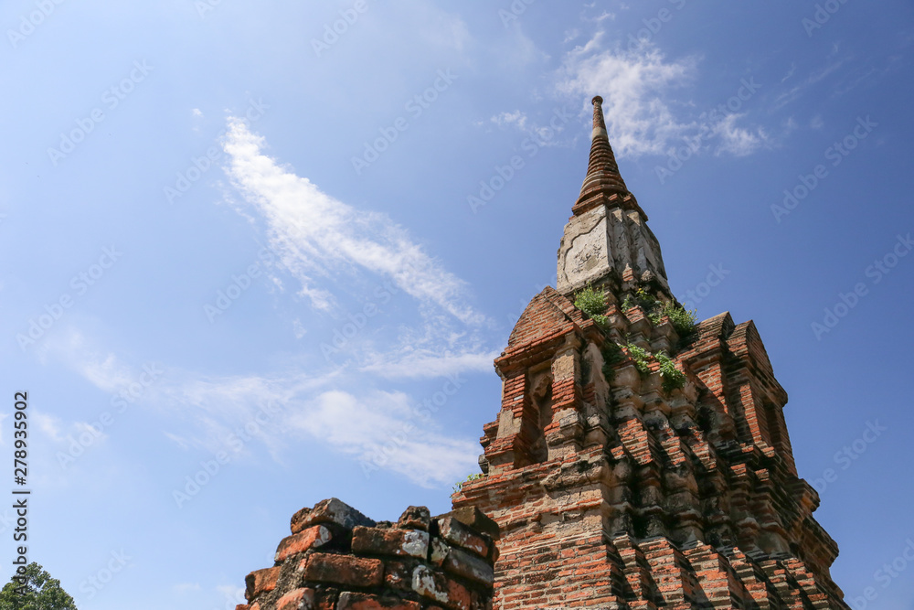 old Pagoda of Ayuttaya public temple in historical park with blue sky