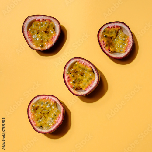 Creative layout made of passion fruit. Flat lay. Food concept. Colorful fruit pattern.