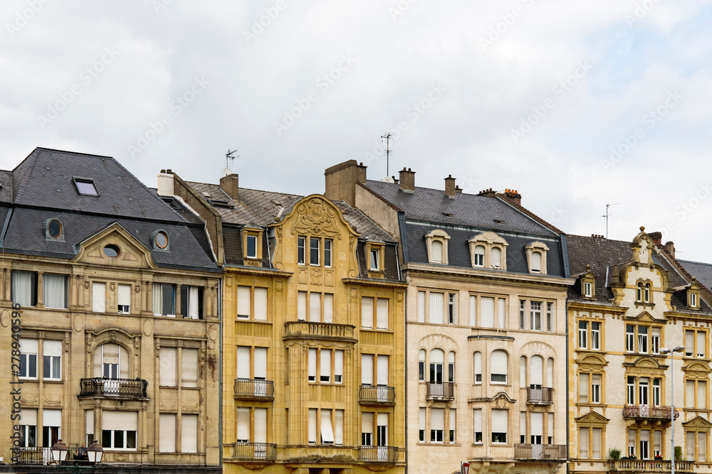 yellow building with apartments in Thionville, France