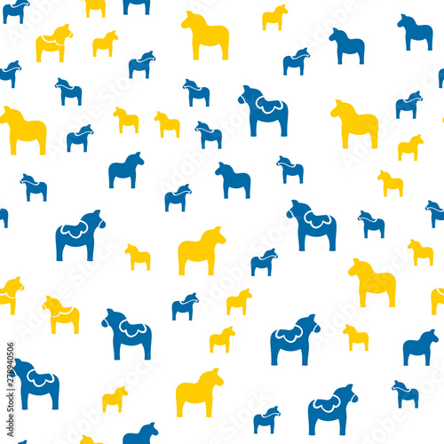Seamless pattern with Dala horse in Swedish flag colors, simple design vector illustration photo