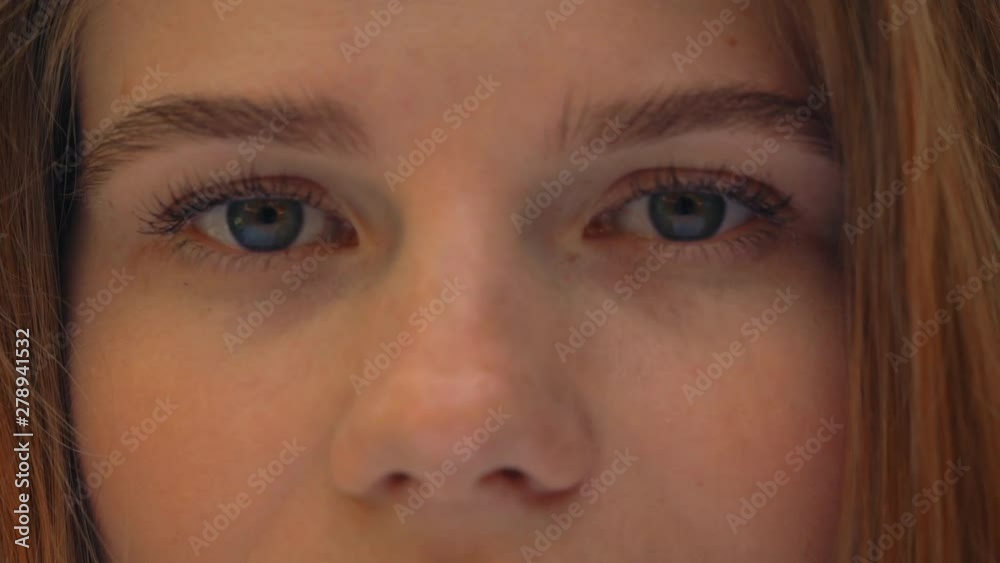 close up upper face young caucasian woman with red hair close up upper face young caucasian woman with red hair