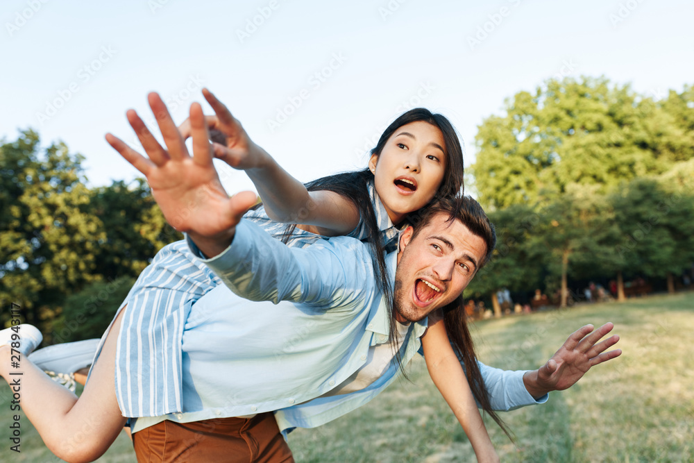 young couple having fun in park