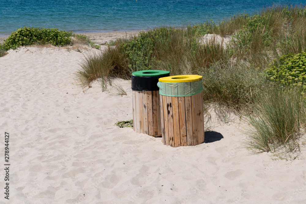 selective sorting bin on the beach on Vendee Island of Noirmoutier Vendee France - obrazy, fototapety, plakaty 